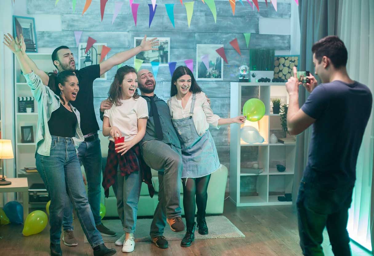 Teenagers laughing and having fun at a party